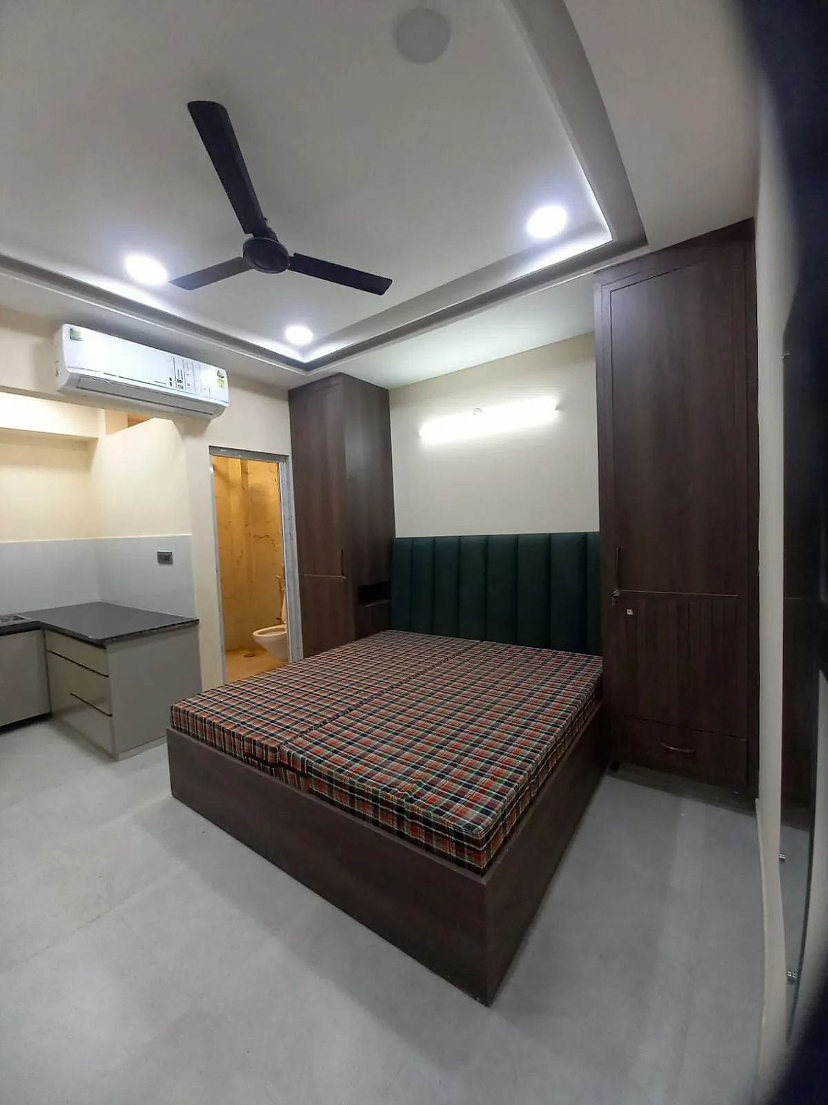 Furnished 1 RK studio with air conditioning, two wardrobes, kitchenette and attached bathroom